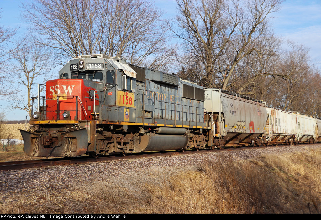 UP 1158 stays busy going backwards past Gustafson Road